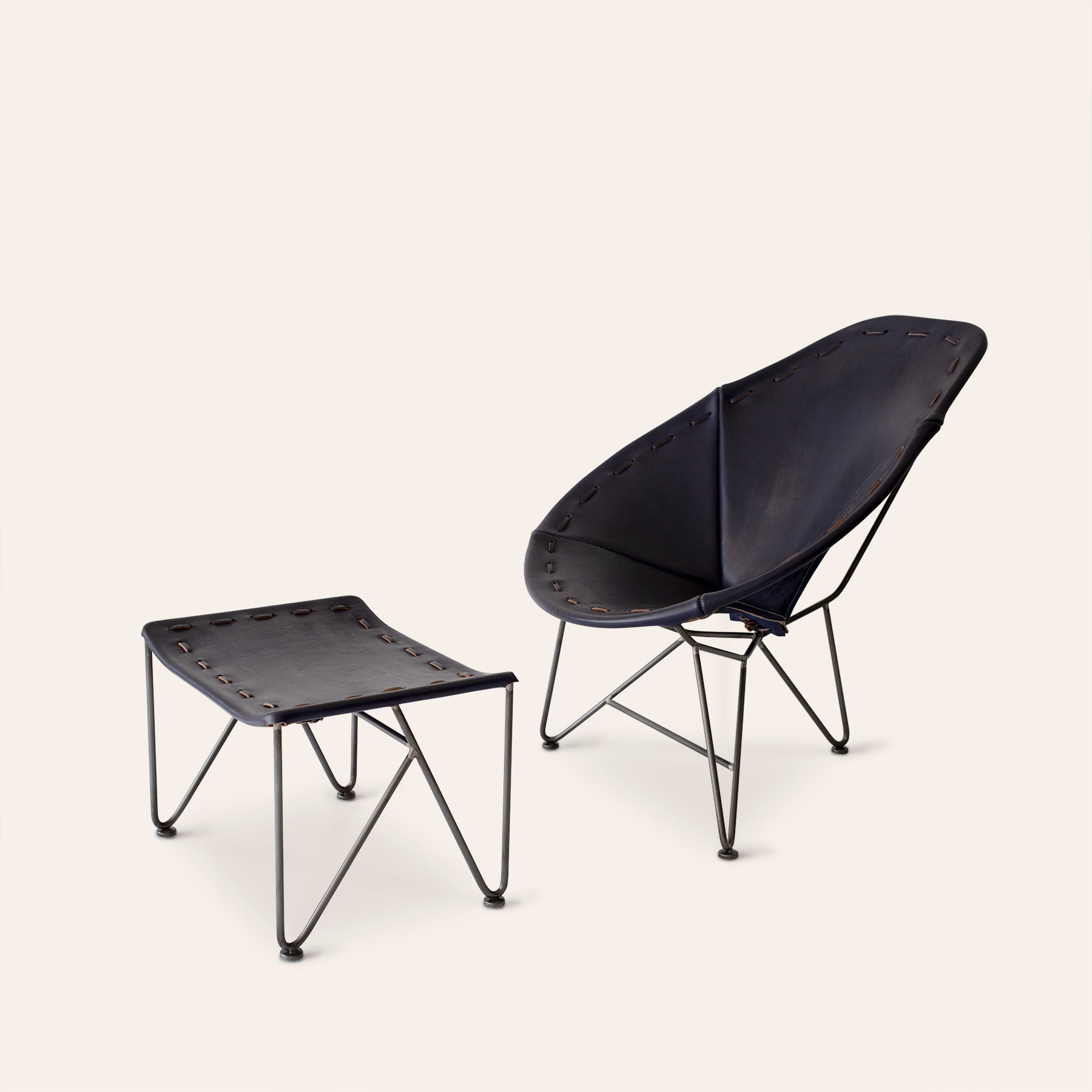 Saddle Leather Oval Chair in Blue with Natural Steel Base
